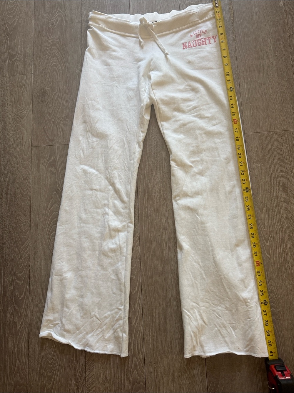 Bejeweled Women’s White Lounge Pants with Pink 'Naughty' Rhinestone Detail